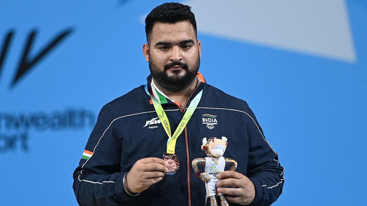 Lovepreet Singh won a bronze in men's 109 kg to continue the country's medal rush in weightlifting at the Commonwealth Games in Birmingham. Credit: AFP Photo