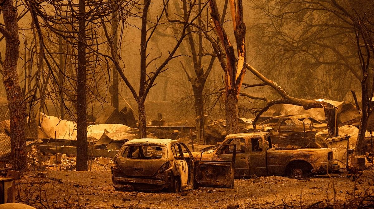 Scorched vehicles and residences line the Oaks Mobile Home Park in the Klamath River community as the McKinney Fire burns in Klamath National Forest, California. Credit: AP Photo