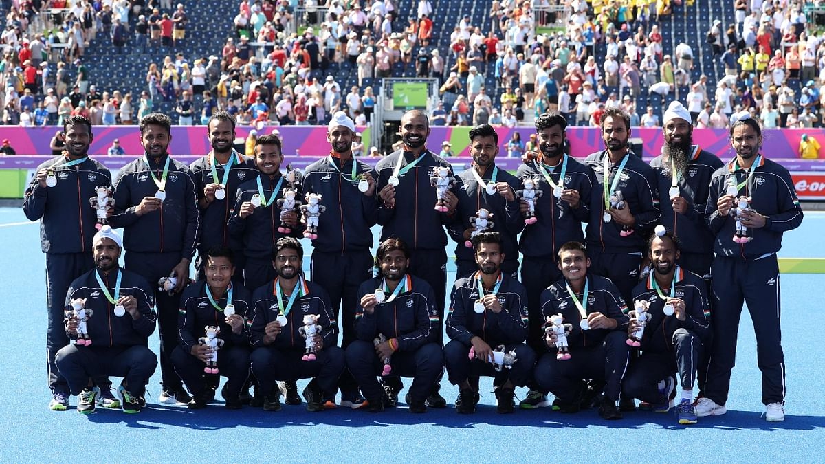 In one of its worst performances in recent times, the Indian men's hockey team suffered an embarrassing 0-7 drubbing at the hands of defending champions Australia to settle for a silver medal at the Commonwealth Games. Credit: AFP Photo