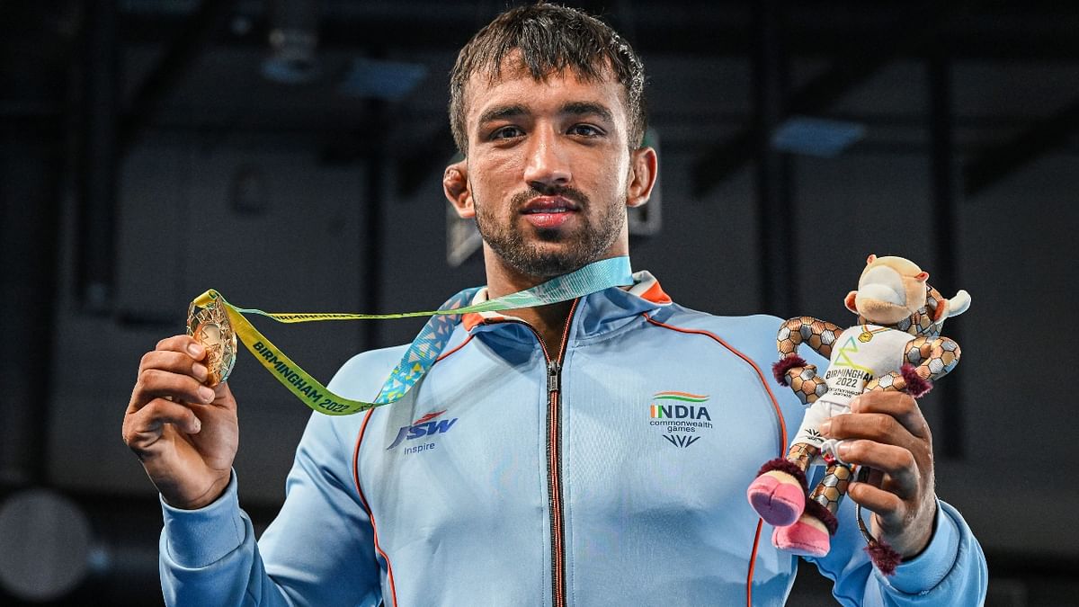 Wrestler Naveen won the gold medal in the men's freestyle 74kg category wrestling at the Commonwealth Games in Birmingham. Credit: PTI Photo