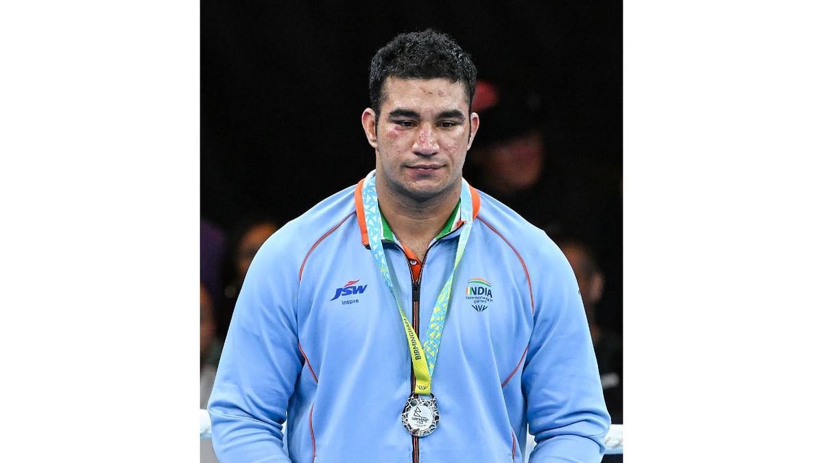 Indian boxer Sagar Ahlawat concluded an impressive Commonwealth Games campaign by clinching the silver medal in the superheavy weight (+92kg) division. Credit: PTI Photo