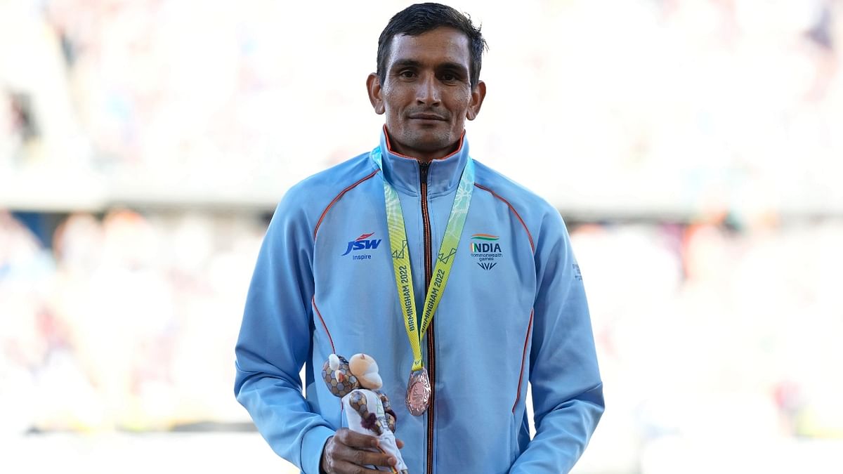 Veteran race walker Sandeep Kumar added another bronze in men's 10,000m event with a personal best time of 38:49.21. Credit: AP Photo