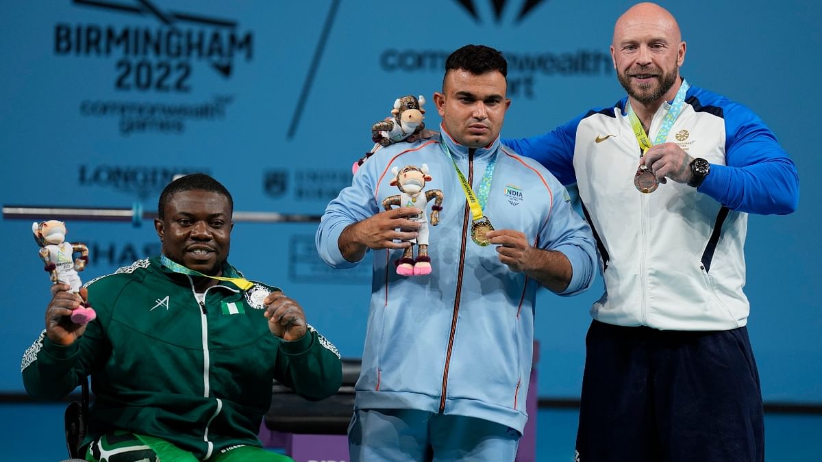 Para-athlete Sudhir won the gold medal in the men's heavyweight para-powerlifting event at the Commonwealth Games in Birmingham. Credit: AP Photo