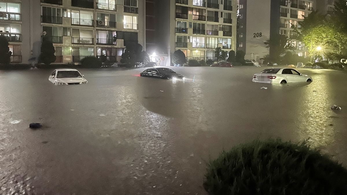 One of the heaviest rains in decades has partially submerged South Korea's capital region, turning Seoul. The streets have turned into rivers and sent floods cascading into subway stations. Credit: Reuters Photo