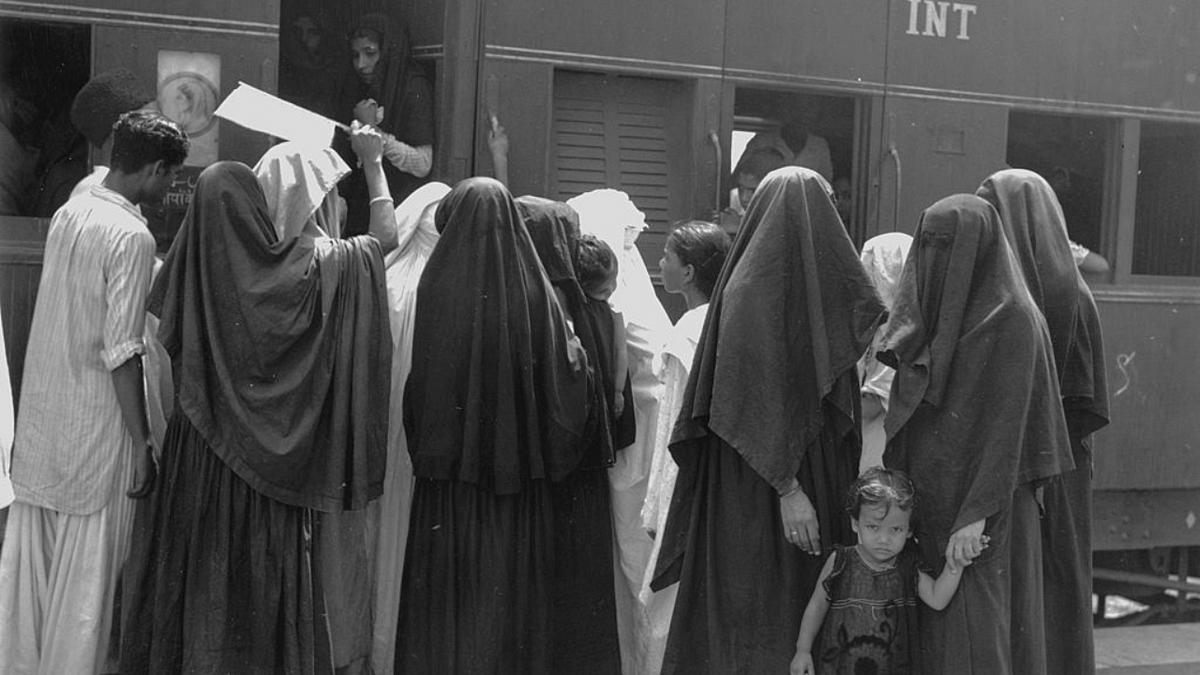 7 August, 1947: Muslim women boarding a train at New Delhi in India to travel to the newly independent Pakistan. Credit: Photo by Keystone Features/Getty Images