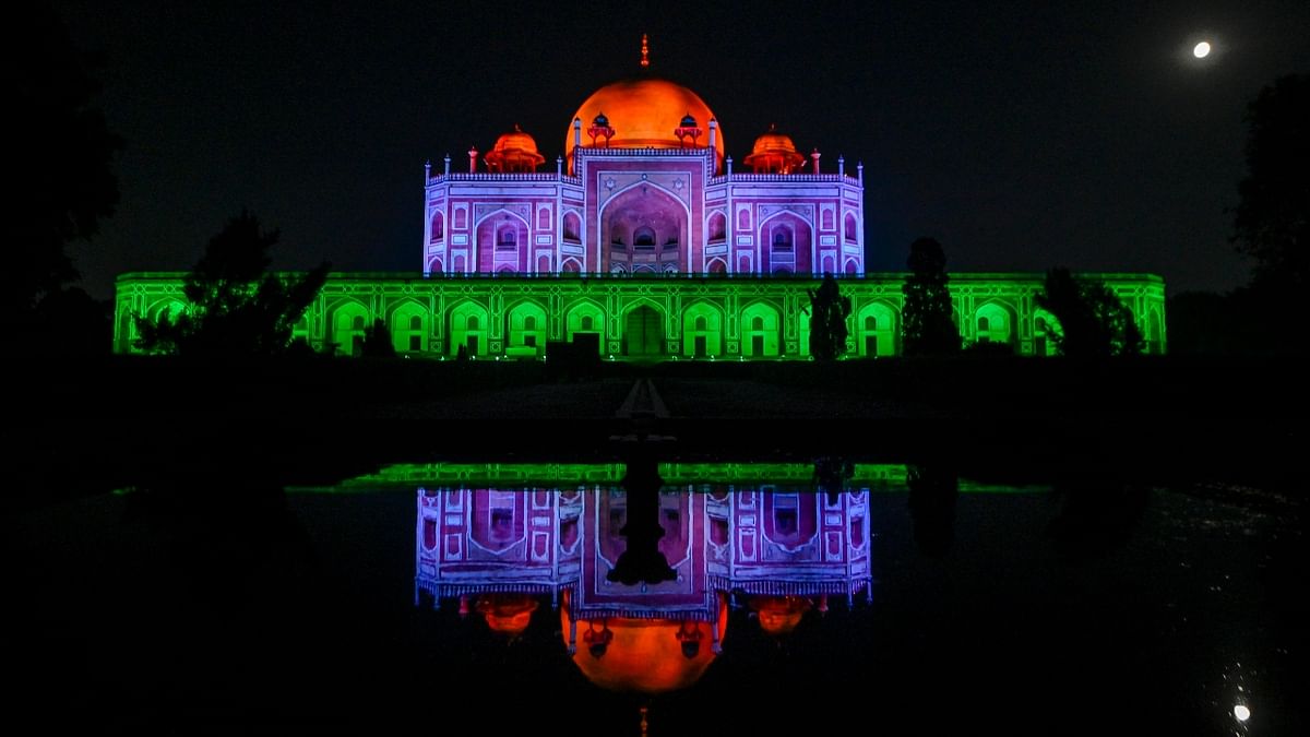 Humayun's Tomb looks spectacular in the three colours as part of 'Azadi ka Amrit Mahotsav' celebrations, ahead of Independence Day, in New Delhi. Credit: PTI Photo