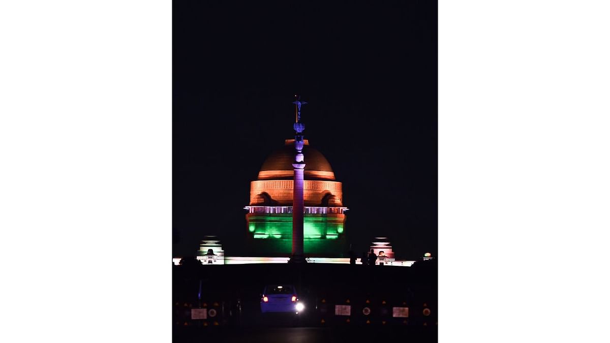 Rashtrapati Bhavan illuminated with tricolour lights as part of 'Azadi ka Amrit Mahotsav' celebrations, ahead of Independence Day, in New Delhi. Credit: PTI Photo