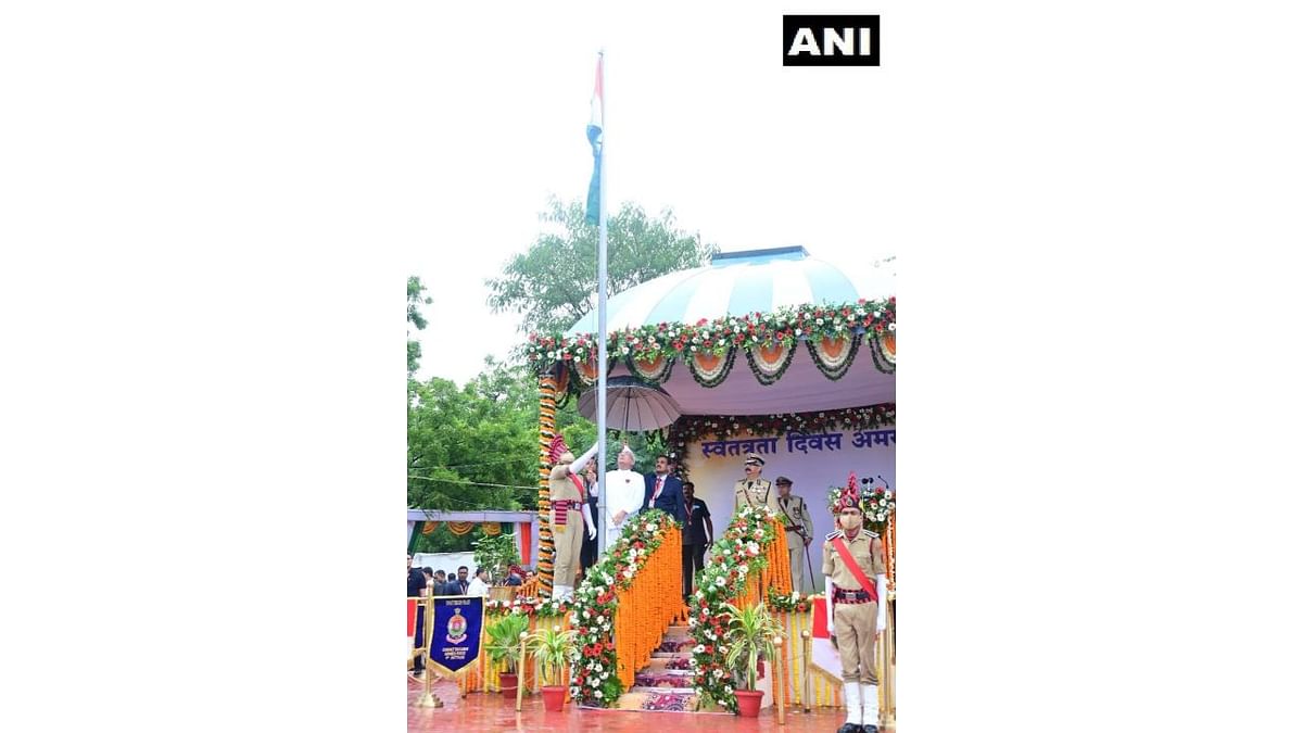 Chhattisgarh Chief Minister Bhupesh Baghel hoists the national flag at Police Parade Ground in Raipur. Credit: ANI
