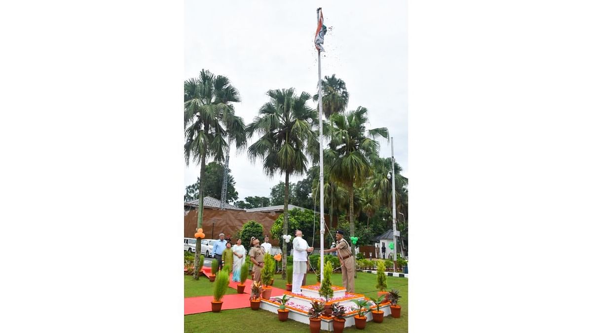 Uttarakhand Chief Minister Pushkar Singh Dhami hoists the national flag at his official residence in Dehradun. Credit: Twitter/pushkardhami