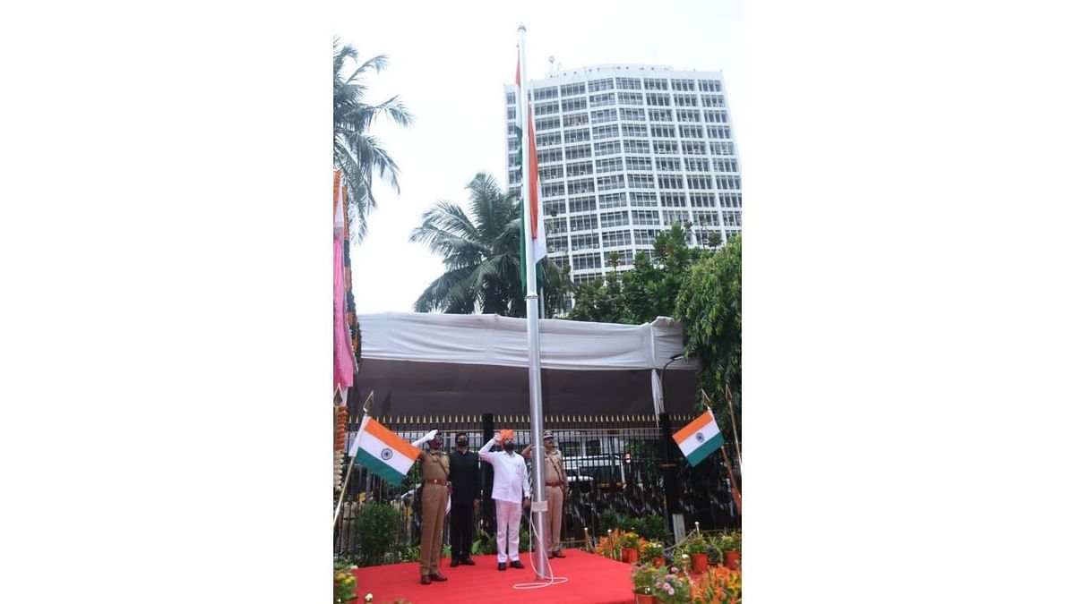 Maharashtra Chief Minister Eknath Shinde salutes after hoisting the national flag in Mumbai. Credit: AIR