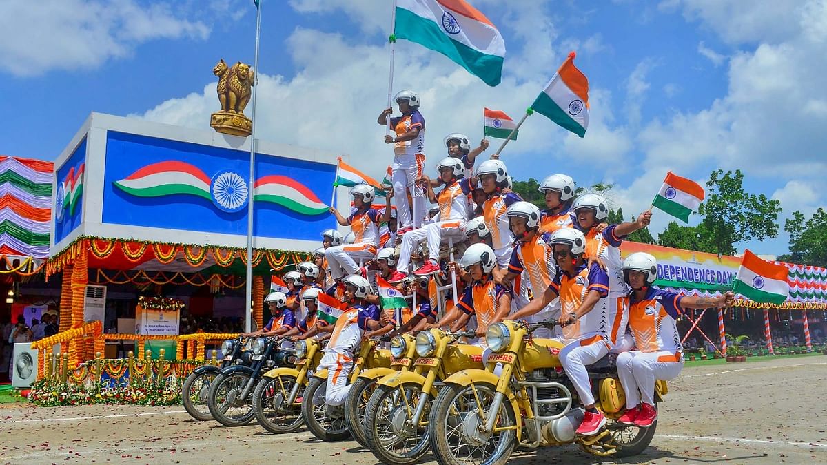 Members of Assam Police motorcycle team 'Daredevils' perform during a function on the occasion of 76th Independence Day, in Guwahati. Credit: PTI Photo