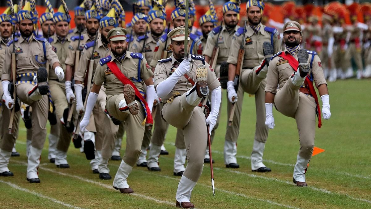 Police officers take part in a parade to celebrate India's Independence Day celebrations in Srinagar. Credit: Reuters Photo