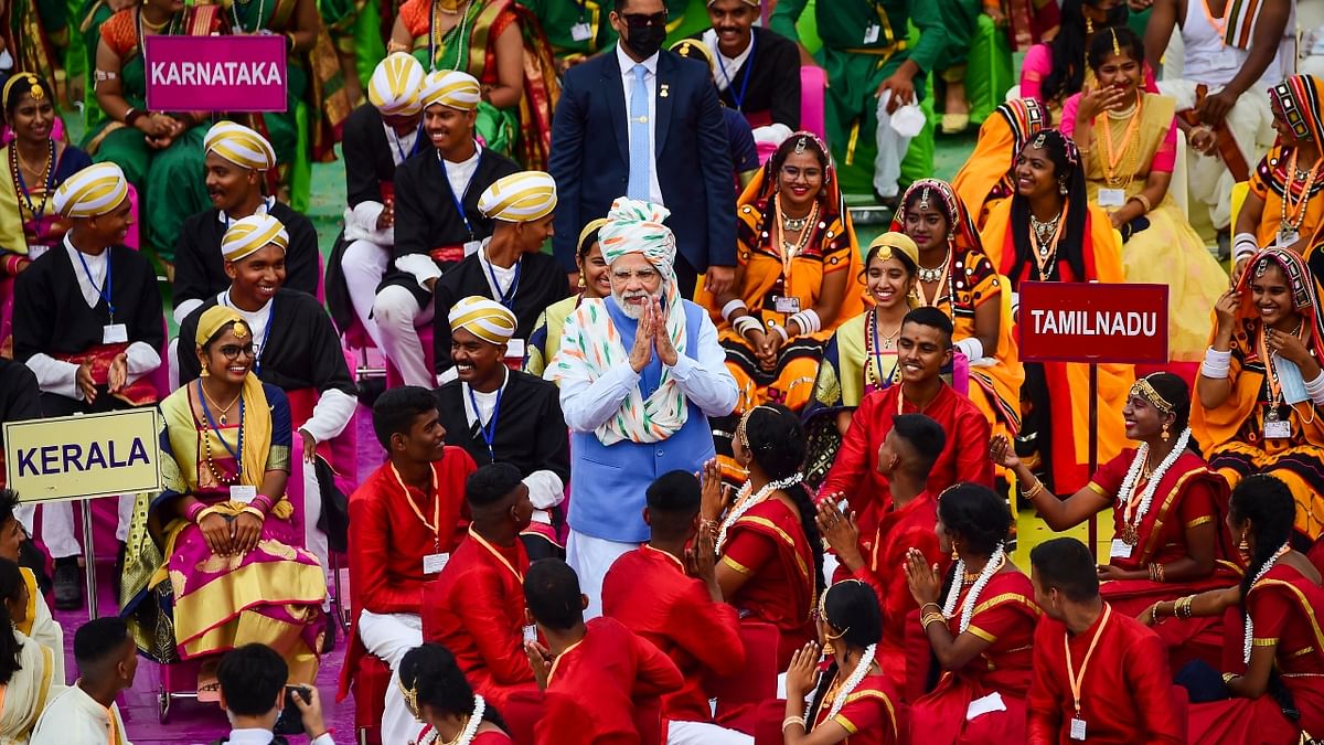 In tune with the 'Har Ghar Tiranga' campaign, Modi's white turban evoked a sense of pride and patriotism among the citizens. Credit: PTI Photo