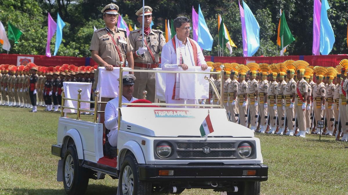 Tripura Chief Minister Manik Saha inspects a parade during the 76th Independence Day function in Agartala. Credit: PTI Photo