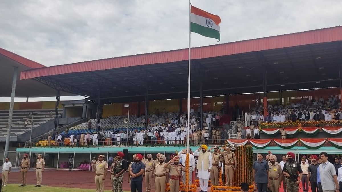 Punjab Chief Minister Bhagwant Mann hoists the national flag at Guru Nanak Stadium in Ludhiana. Credit: ANI