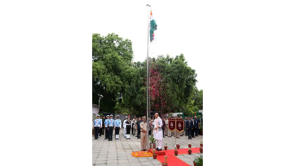 Defence Minister Rajnath Singh hoists the national flag on the occasion of Independence Day at his residence in New Delhi. Credit: Twitter/rajnathsingh