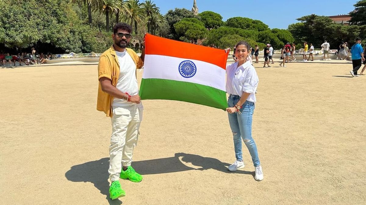 The couple also showcased their love for India by celebrating the 76th Independence Day in Barcelona. The couple posted a series of pictures holding the tricolour at famous tourist spots in the city. Credit: Instagram/wikkiofficial