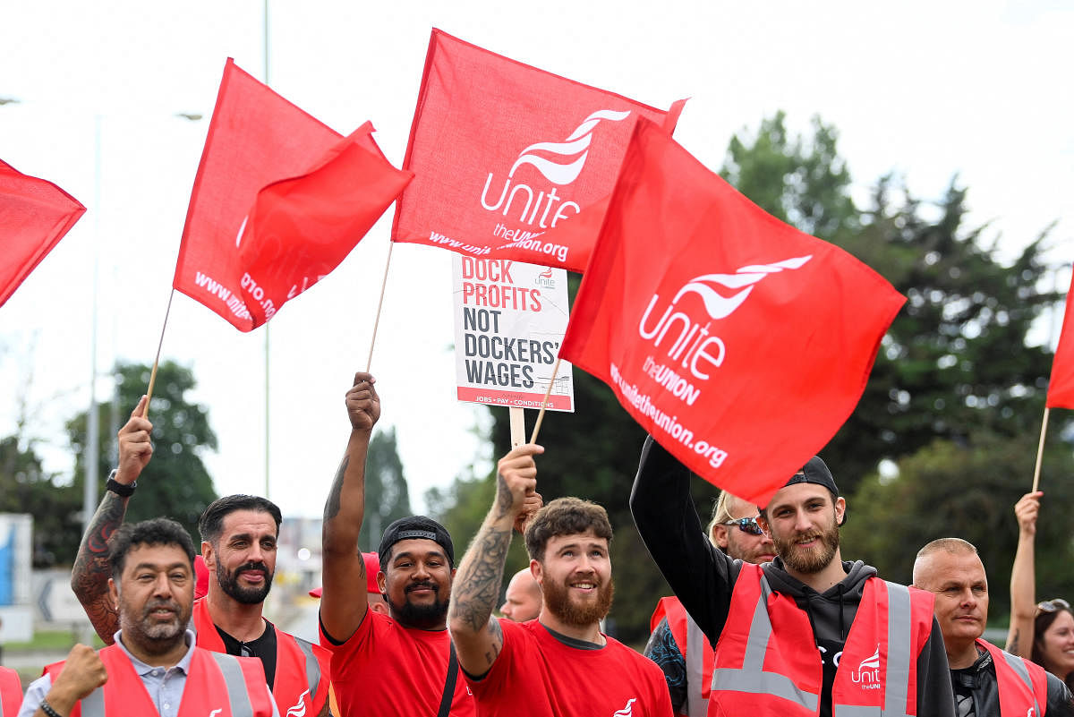 Workers protest outside of an entrance at the UK's biggest container port Felixstowe as they begin an 8-day strike, in Felixstowe, Britain. Credit: Reuters Photo