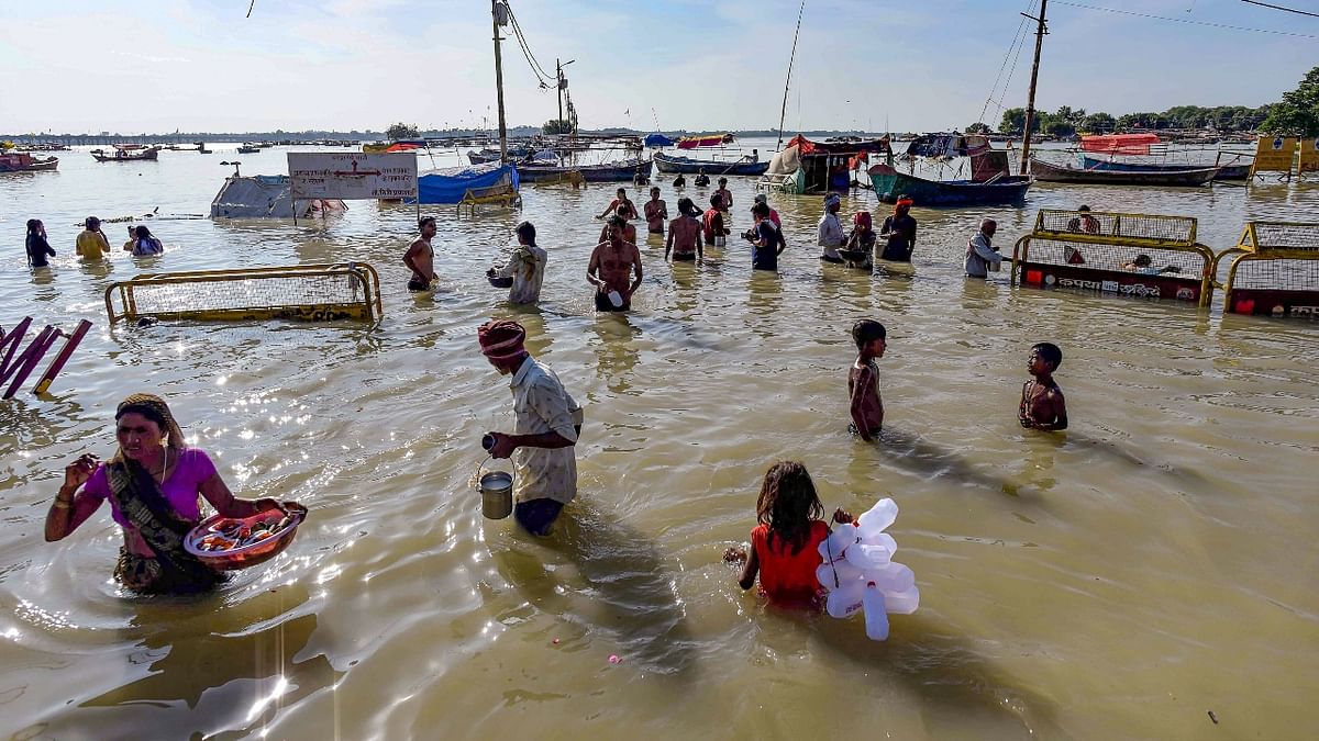 Meanwhile, the administration has dismissed the bathing of people at the Ghats of Sangam beach amid the sudden rise in water flow. Credit: PTI Photo