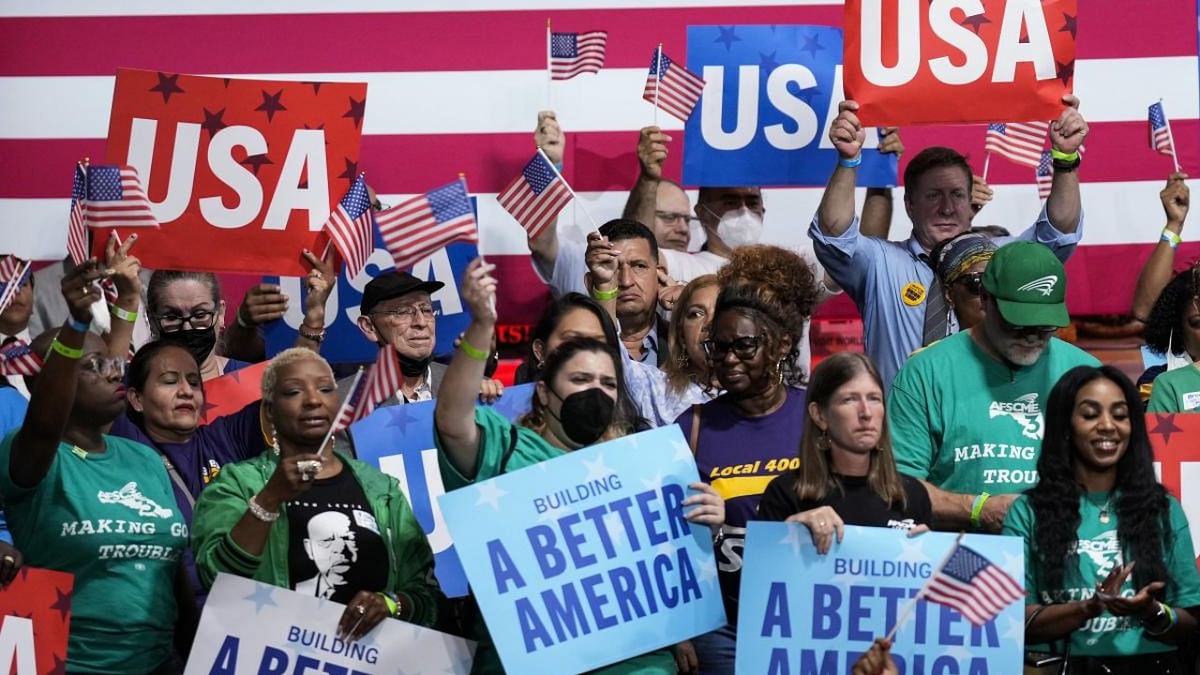 Supporters cheer at a Democratic National Committee (DNC) rally at Richard Montgomery High School on August 25, 2022 in Rockville, Maryland. Credit: AFP Photo