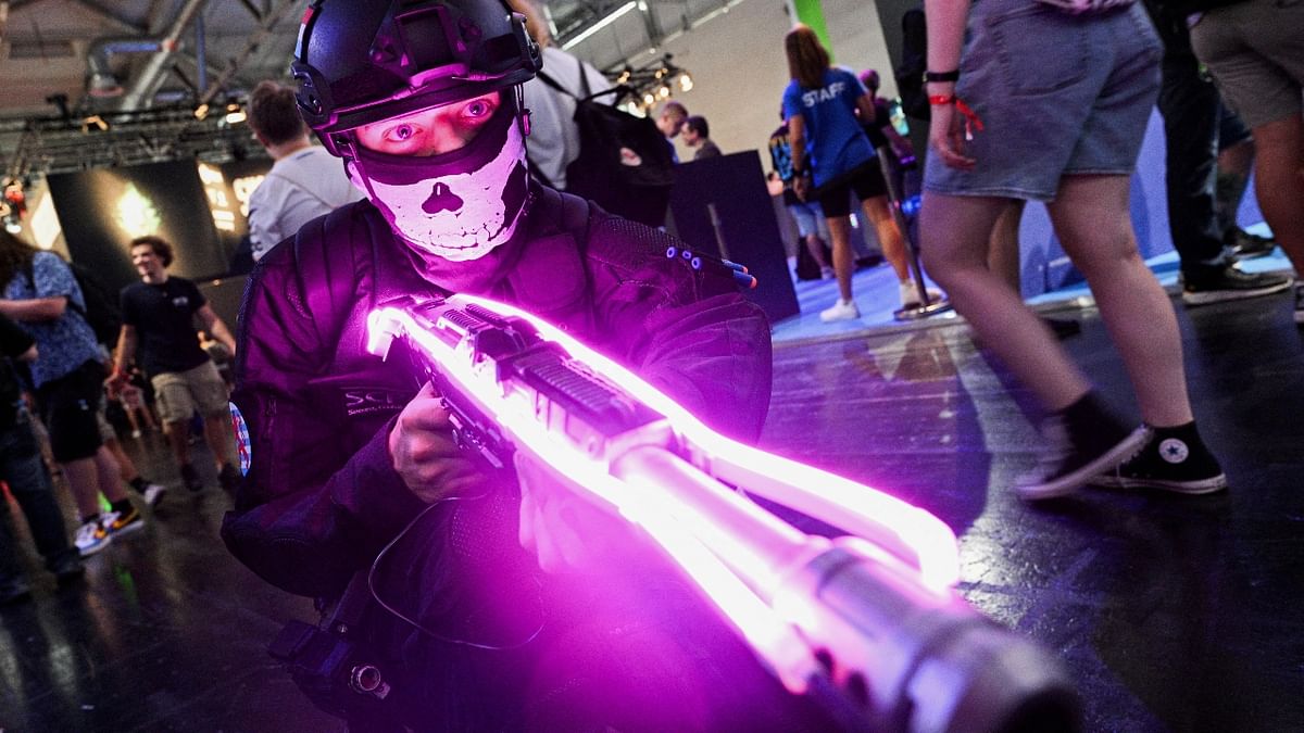 A man poses as a member of the 'SCP Foundation' at the Gamescom 2022. Credit: Reuters Photo