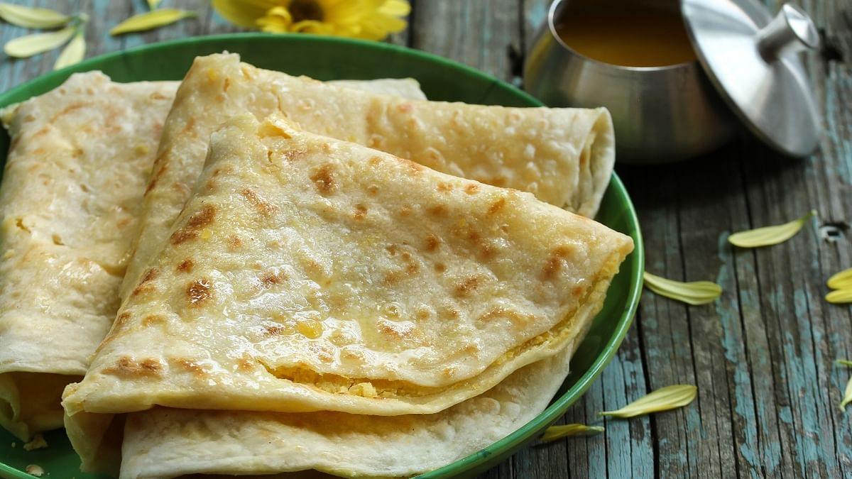 Puran Poli: A traditional Maharashtrian dish, Puran poli is flat bread studded with lentils and jaggery which is commonly offered to the God in the state. Credit: Getty Images