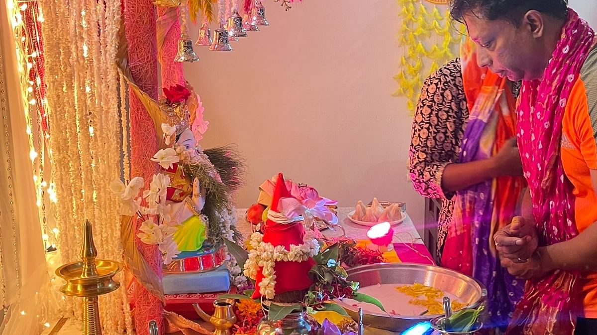 Dressed in traditional attire, Bollywood filmmaker Anand Kumar is seen performing Ganesh Puja. Anand Kumar and his family bring Ganpati home amid great fervour every year. Credit: Instagram/officialanandkumar