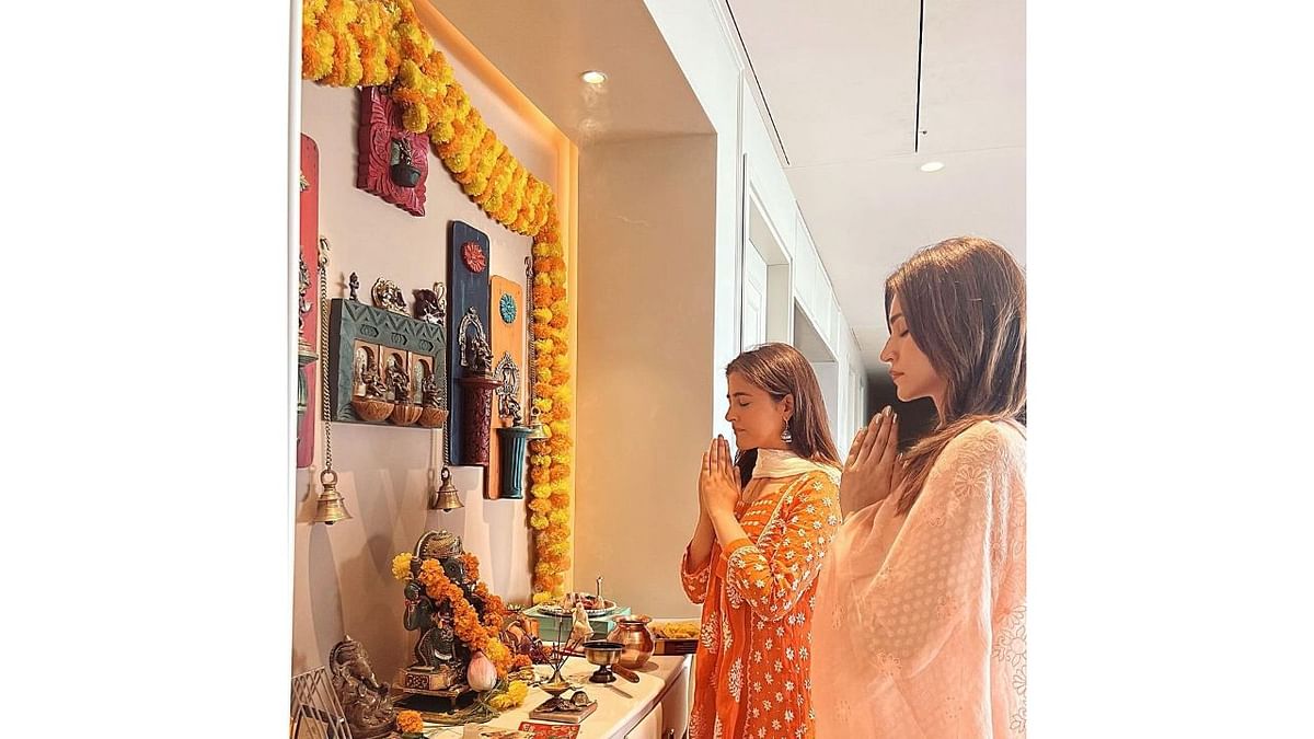 Bollywood actor Kriti Sanon posted a photo on Instagram where she was seen can be seen praying to lord Ganesha along with her sister Nupur Sanon. Credit: Instagram/kritisanon
