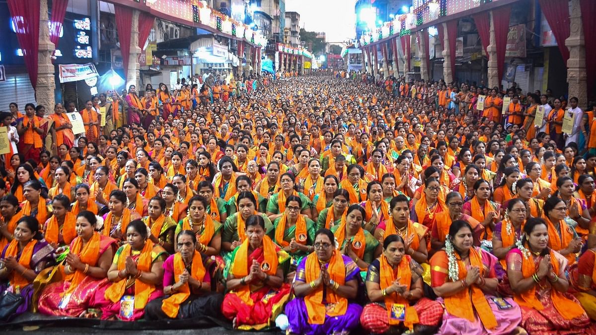 Women offer prayers on the occasion of the Ganesh Chaturthi festival in Pune. Credit: PTI Photo