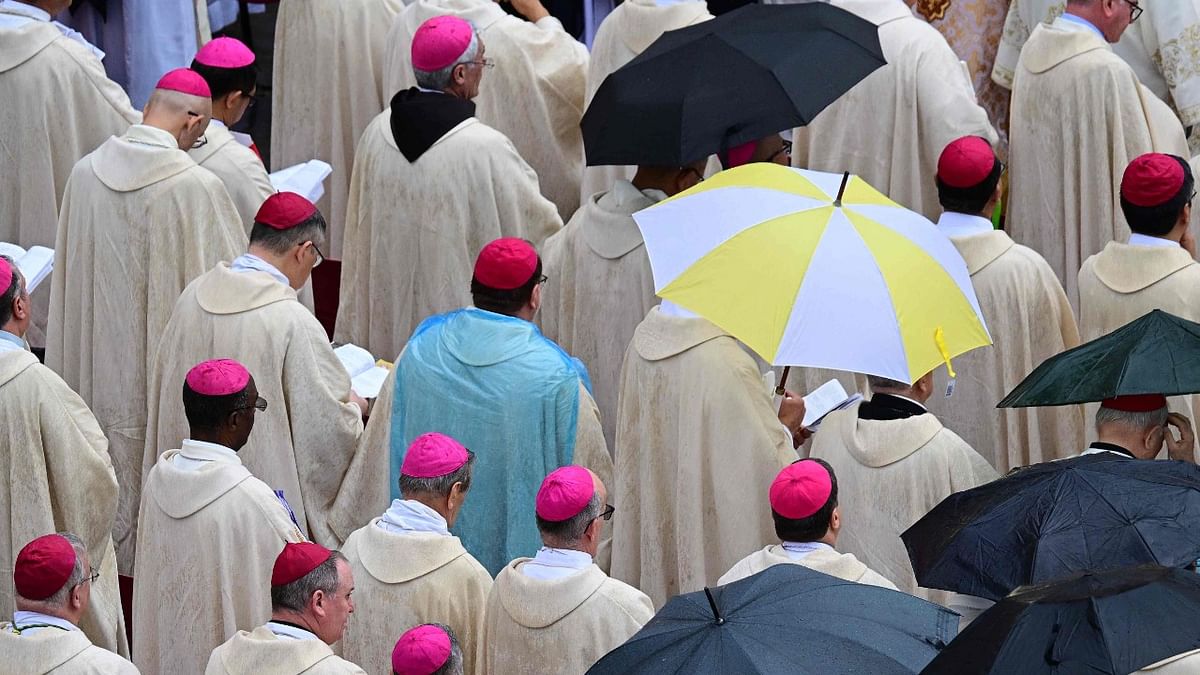 Cardinals and Bishops attend, under the rain, a Pope's beatification mass of late Pope John Paul I, on September 4, 2022 at St. Peter's square in the Vatican. Credit: AFP Photo