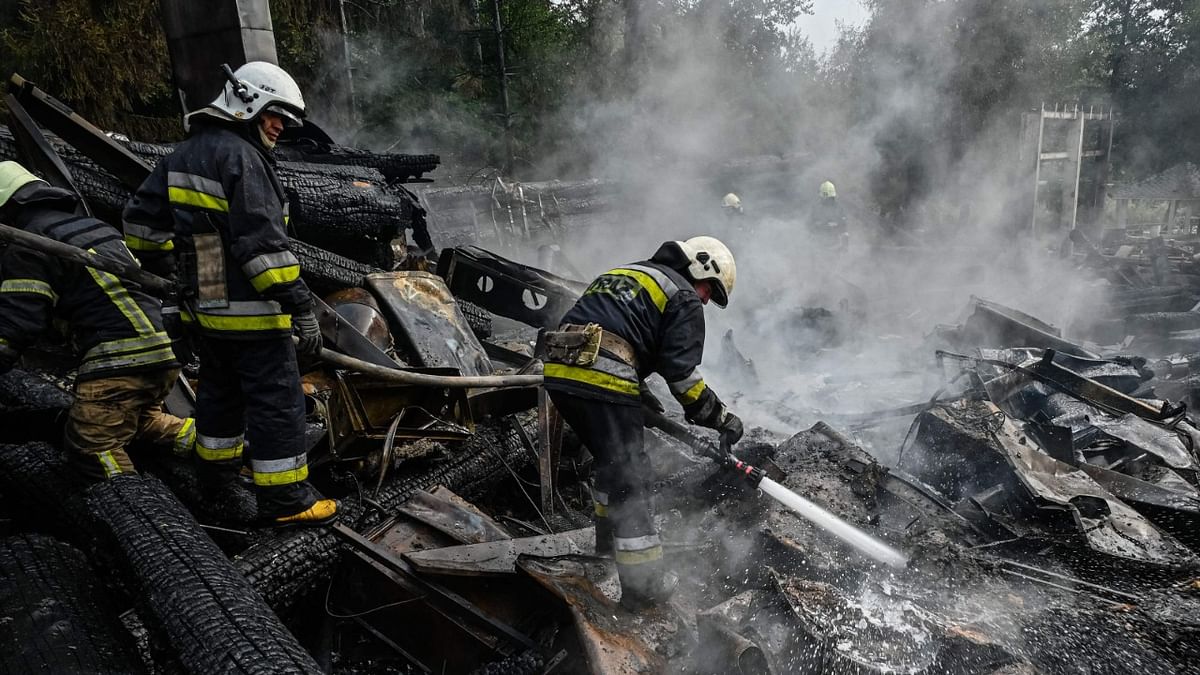 Firefighters douse the rubble of a restaurant complex destroyed by a missile strike in the second largest Ukrainian city of Kharkiv, on September 4, 2022, amid the Russian invasion of Ukraine. Credit: AFP Photo