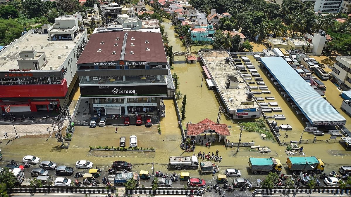 An aerial view of flooded Rainbow Drive Layout after heavy monsoon rains at Sarjapur. Credit: PTI Photo