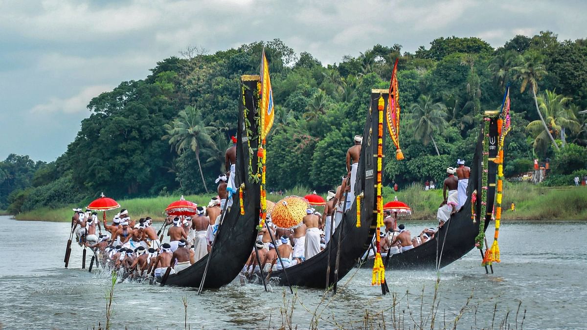 Boat Race: Head to Aranmula in order to witness the famous snake boat race which is an annual celebration at Sri Parthasarathy Temple. Credit: PTI Photo