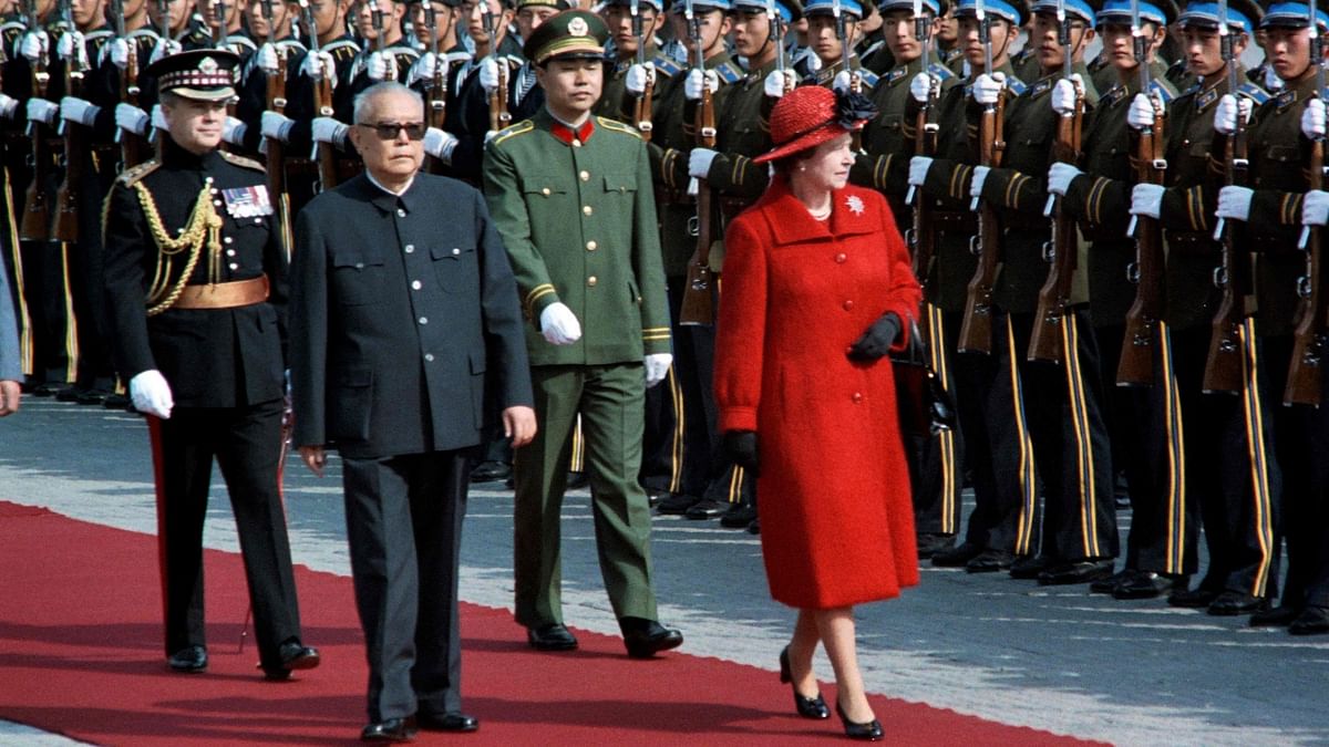 Queen Elizabeth II with Chinese President Li Xiannian in Beijing, 1986. Credit: AFP Photo