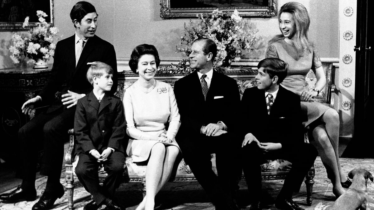 Britain's Queen Elizabeth II and Prince Philip are seated with their children, Prince Charles, Prince Edward, Prince Andrew and Princess Anne at Buckingham Palace on the occasion of the royal couple's silver wedding anniversary. Credit: AP Photo