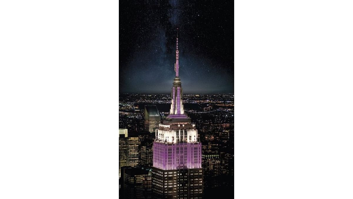 Empire State Building shone in purple and sparkle in silver to honor the life and legacy of Her Majesty, Queen Elizabeth II. Credit: Twitter/@EmpireStateBldg