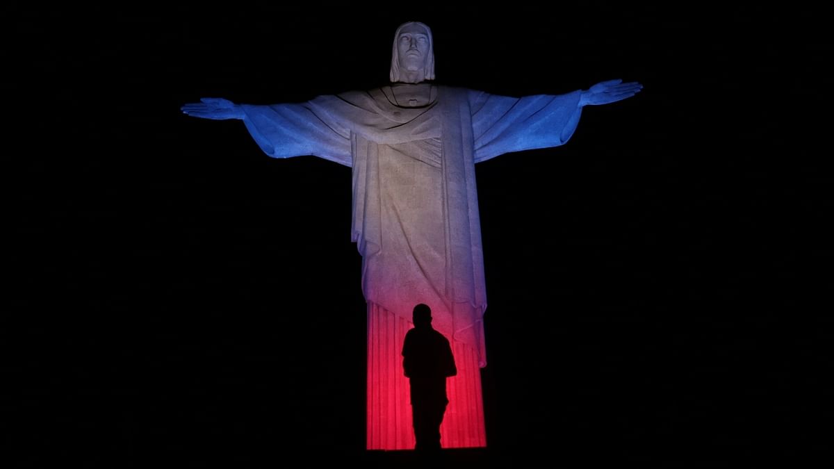 The Christ the Redeemer statue is illuminated with the Union Jack flag colours after Brazil's government decreed three days of mourning following the death of Queen Elizabeth II, in Rio de Janeiro, Brazil. Credit: Reuters Photo