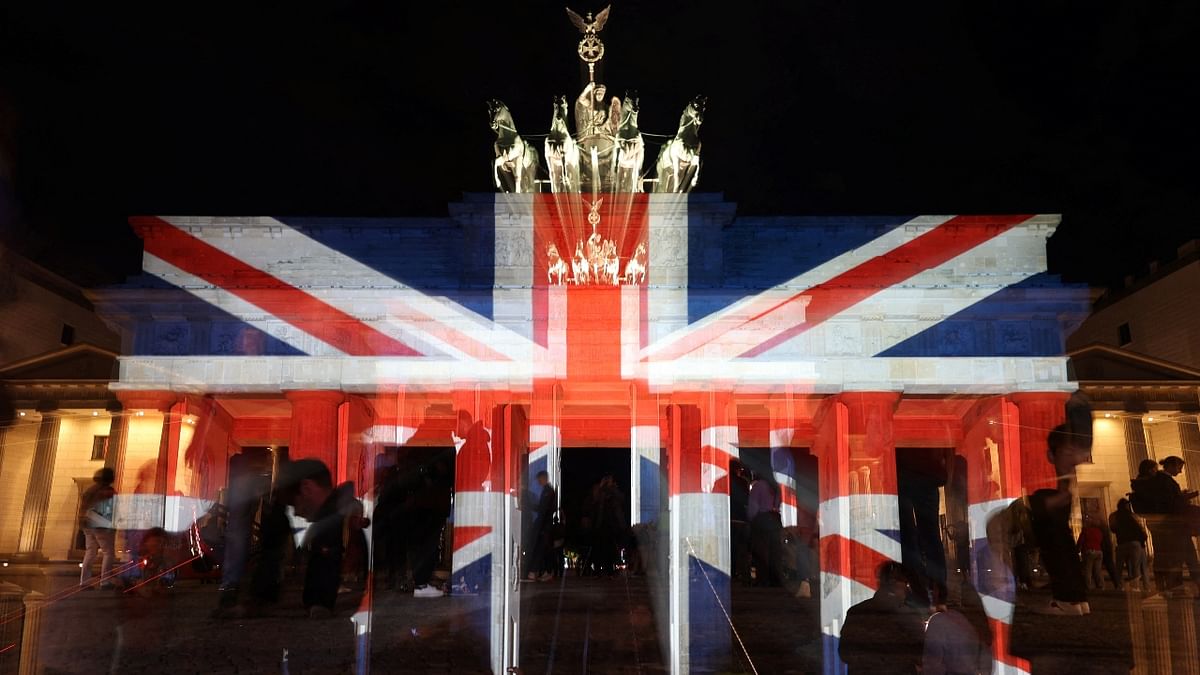 The Brandenburg Gate is illuminated with the Union Jack flag following the death of Queen Elizabeth II, Britain's longest-reigning monarch, in Berlin, Germany. Credit: Reuters Photo