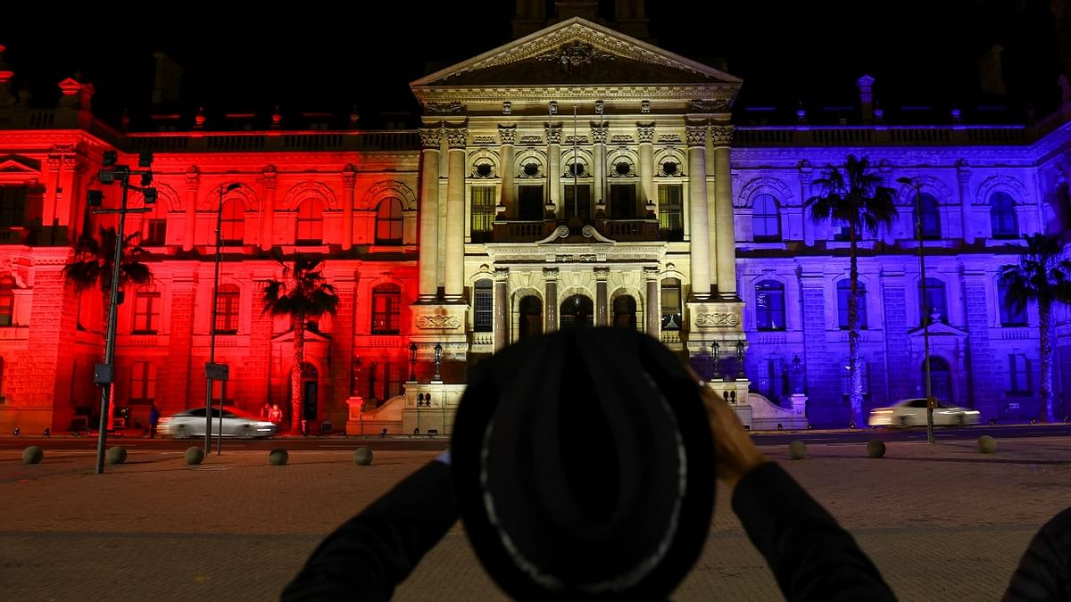 The City Hall is illuminated in the colours of the Union Jack to pay tribute to Britain's Queen Elizabeth II, who has passed away, in Cape Town, South Africa. Credit: Reuters Photo