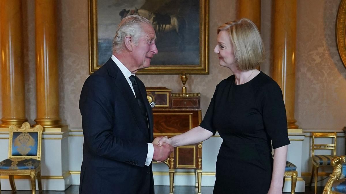 Britain's King Charles III (L) greets Britain's Prime Minister Liz Truss (R) during their first meeting at Buckingham Palace in London on September 9, 2022. Credit: AFP Photo