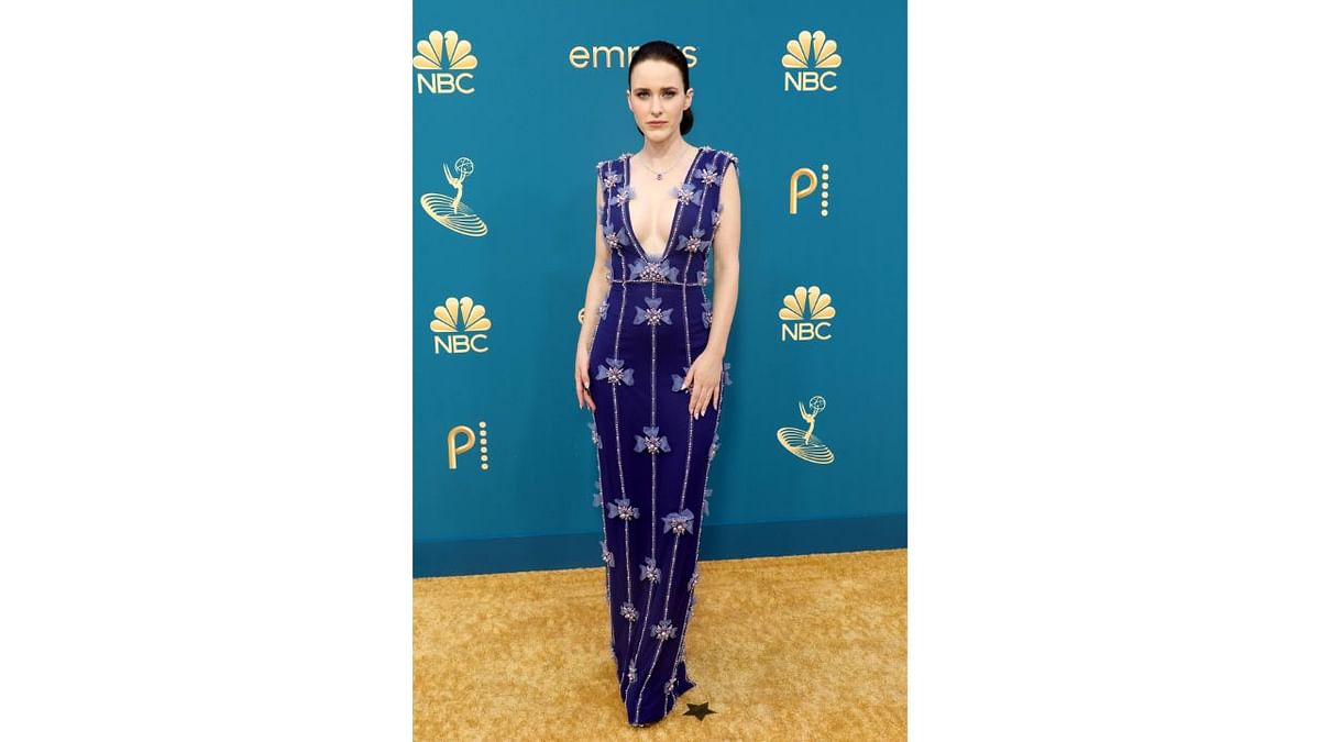 Rachel Brosnahan stood out in a plunging Pamella Roland column gown in a beautiful violet dress. Credit: AFP Photo