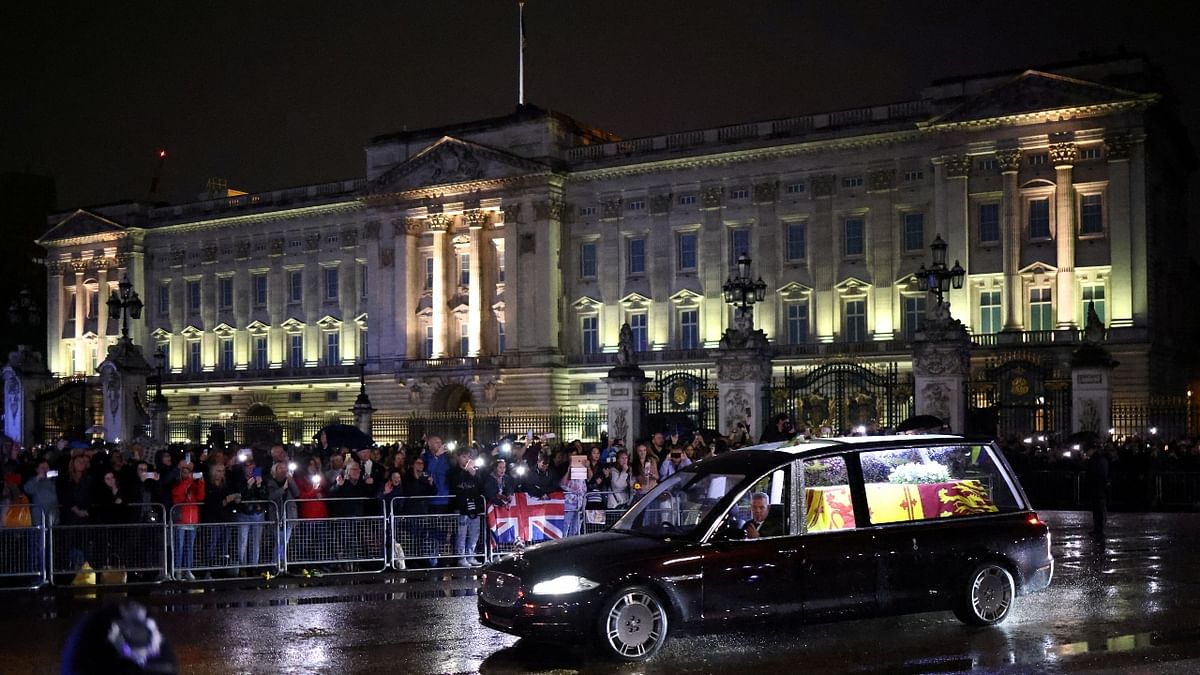 Crowds of Londoners lined the streets to catch a glimpse of the royal hearse as it was driven from the Royal Air Force base in the city’s west to the queen’s official residence. Credit: Reuters Photo
