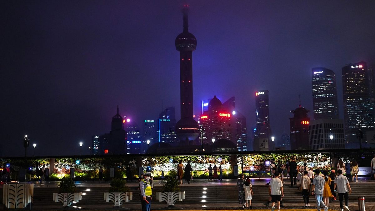 China’s financial center Shanghai rounds off the top ten list of 'cities with the most millionaires in the World' with 1.3 lakh millionaires. Credit: AFP Photo