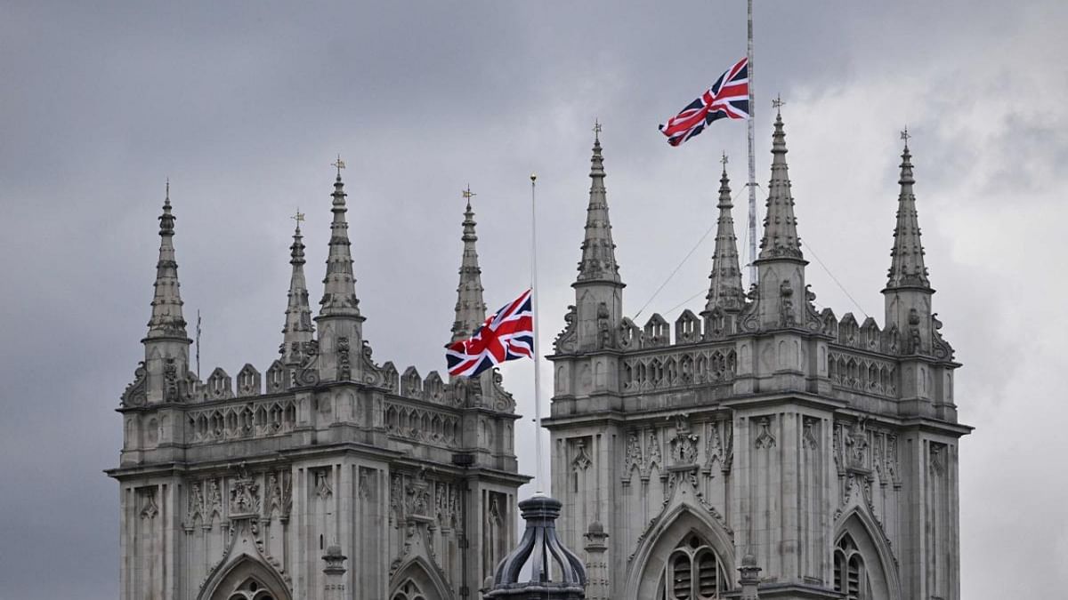 The Union Jack flag flies half mast at Westminster Abbey in London on September 15, 2022, following the death of Britain's Queen Elizabeth II on September 8. Credit: AFP Photo