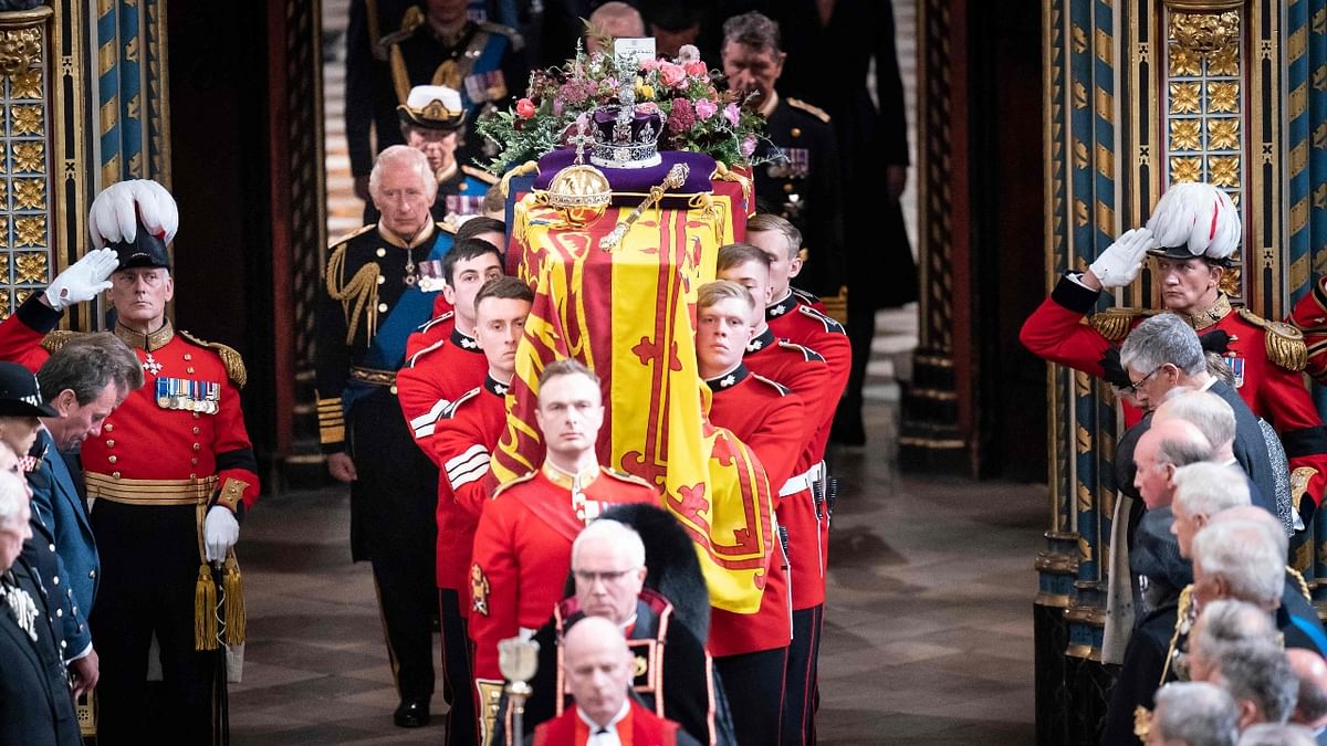 Queen Elizabeth II, Britain's longest-reigning monarch, has been laid to rest alongside her late husband Prince Philip in a private burial at St George's Chapel after her state funeral at Westminster Abbey on September 19. Credit: AFP Photo