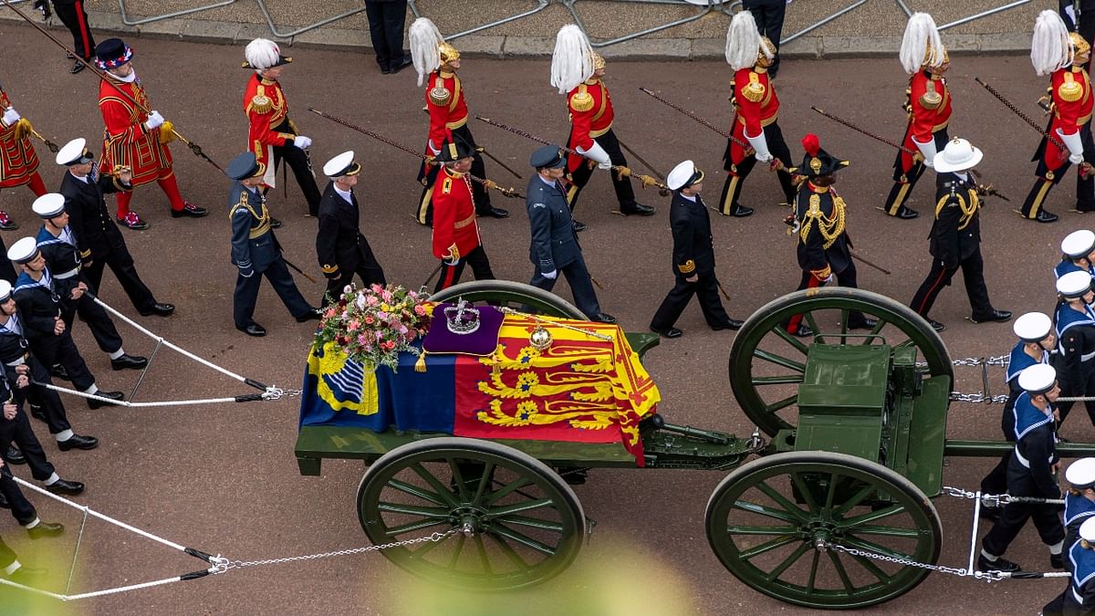 The State Gun Carriage, pulled by 142 Naval Ratings carrying the coffin of Queen Elizabeth II moves along the Procession route. Credit: Reuters Photo