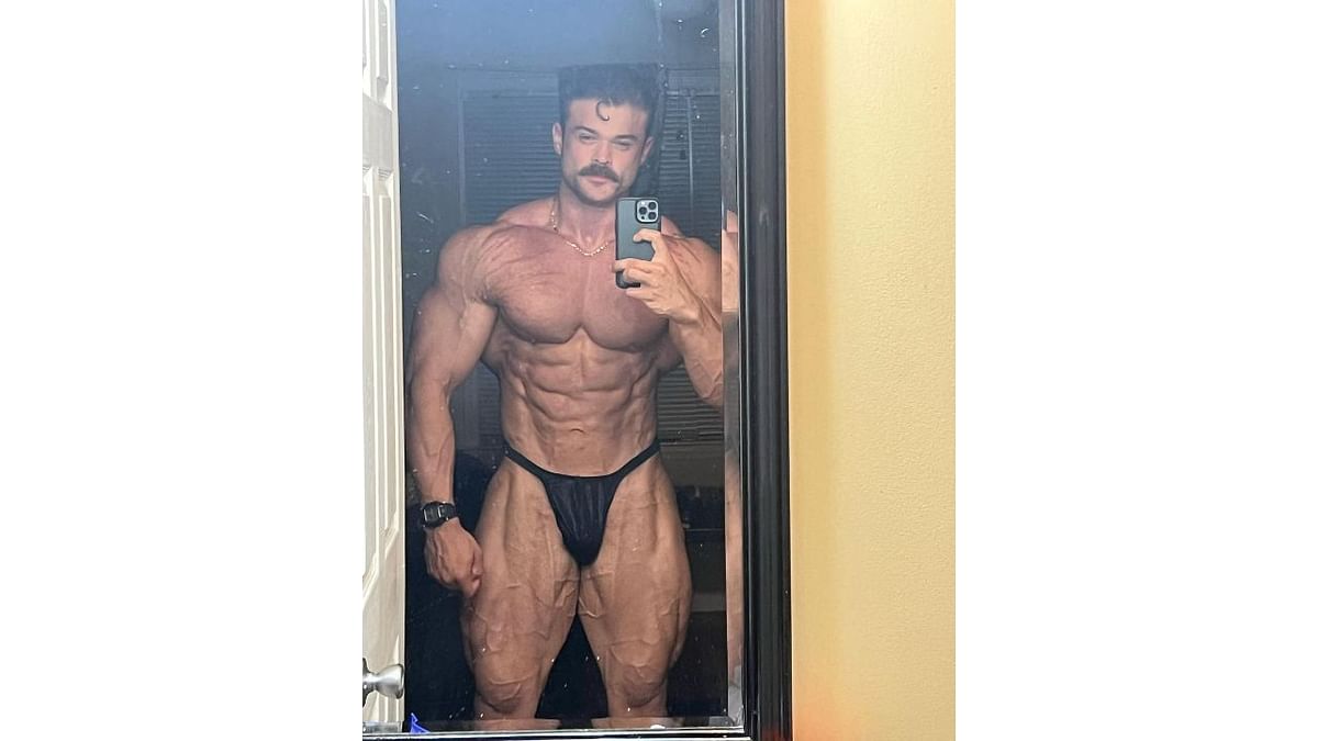 In the picture, flaunting his ripped body in a mirror selfie, Effer shared a near-similar look rocking Anil Kapoor's signature moustache look from the 90s. Credit: Instagram/ @johneffer