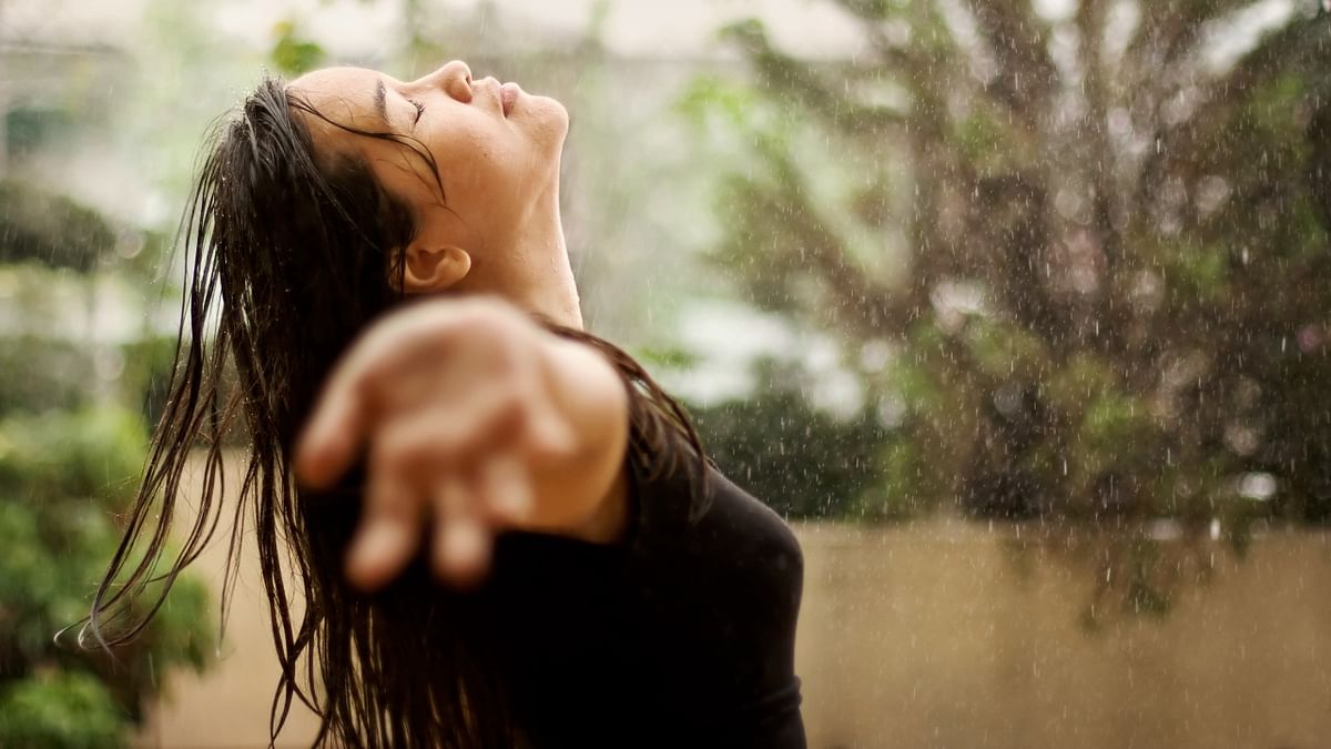 If you're exposed to rain, make sure that you wash your hair as the rainwater's acidity trapped in hair may cause an imbalance in the scalp’s pH, and aggravate hair problems. Credit: Getty Images