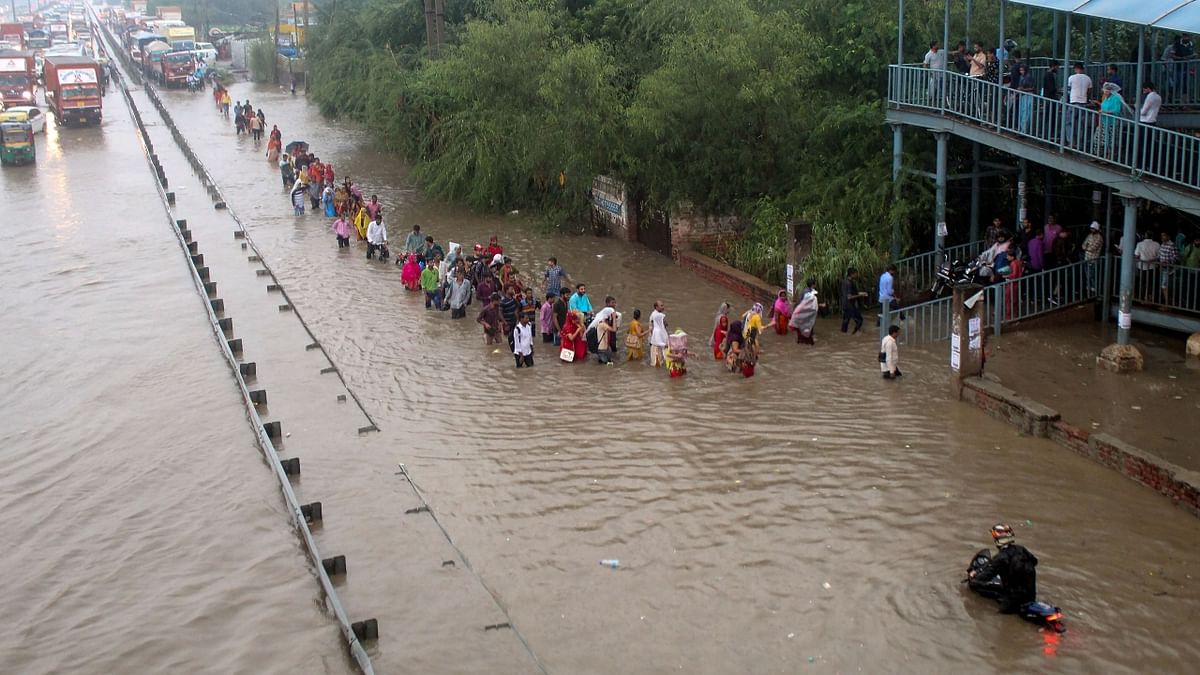 The IMD issued a 'yellow alert', cautioning people about moderate rain at most places in Delhi. Credit: PTI Photo