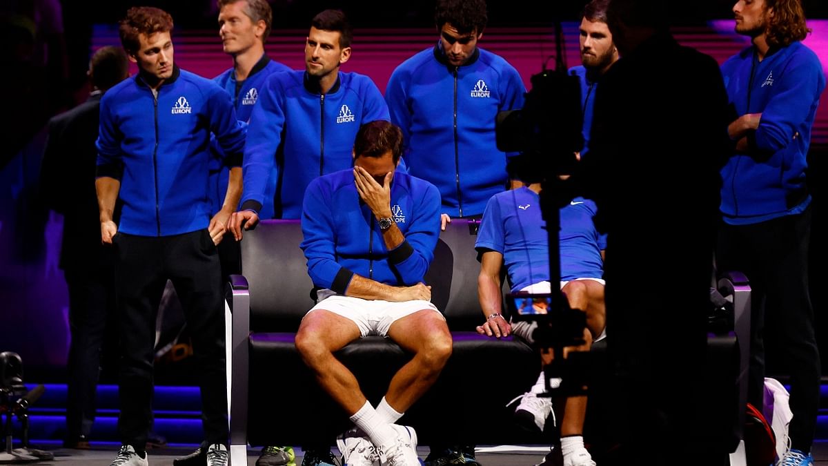 Roger Federer is seen getting emotional at the end of his last match after announcing his retirement. Credit: Reuters Photo